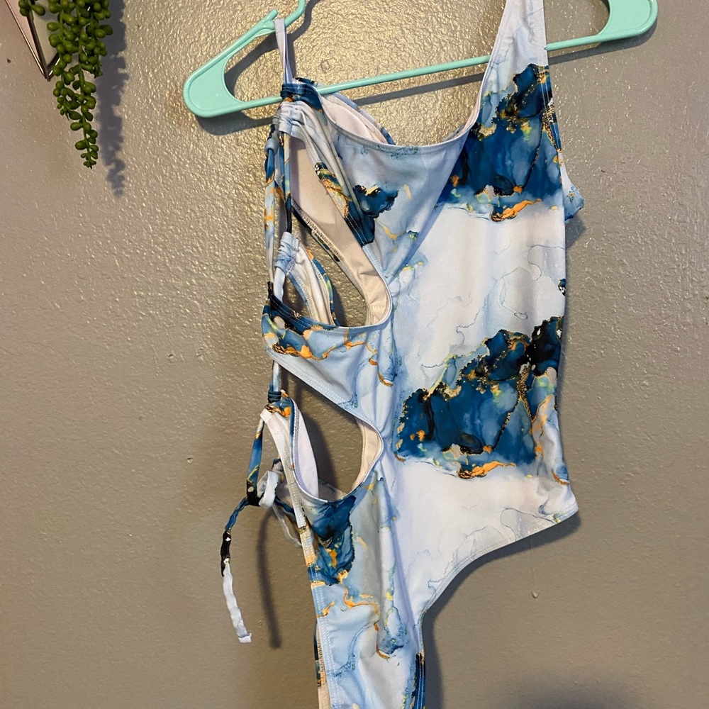 A polyester marble bathing suit